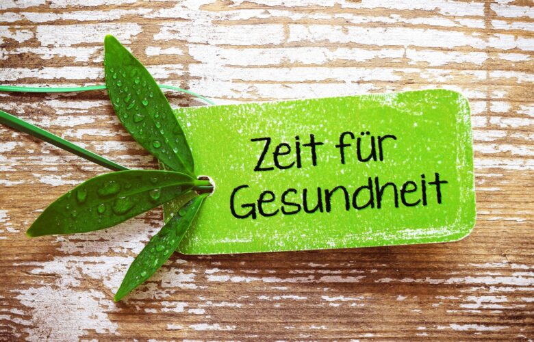 Grünes Schild mit Schriftzug Zeit für Gesundheit | Radiologie Frankfurt